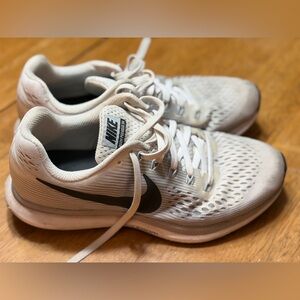 Women’s Nike running shoes. Size 8.5. White.